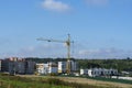 Construction site of apartment buildings with a tower crane Royalty Free Stock Photo
