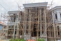 Construction site with bamboo scaffolding in Luang Namtha town, La