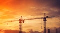 Big crane and building construction against beautiful dusky sky Royalty Free Stock Photo