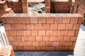 Construction site with brickwork and bricklaying. Industrial details