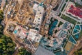 Construction site with building cranes and other equipment, industrial built or estate development modern buildings, aerial view Royalty Free Stock Photo