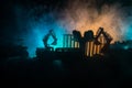 Construction site on a city street. A yellow digger excavator parked during the night on a construction site. Industrial concept t Royalty Free Stock Photo