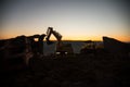 Construction site on a city street. A yellow digger excavator parked during the night on a construction site. Industrial concept t Royalty Free Stock Photo