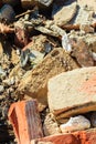 Construction site. Closeup stack of old bricks.