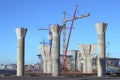 Construction site with concrete supports, and erected the tower