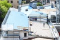 Construction site. Construction crew working on the roof sheeting.