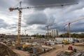 Construction site with cranes against sky Royalty Free Stock Photo