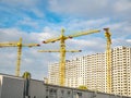 Construction site with cranes against the sky Royalty Free Stock Photo