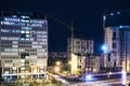 Construction site with cranes on dark sky background at night Royalty Free Stock Photo