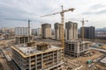 Construction site with cranes and formworks Royalty Free Stock Photo