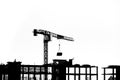 Construction site with cranes on silhouette background Royalty Free Stock Photo