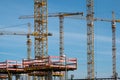 Construction site and cranes at work Royalty Free Stock Photo