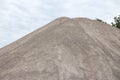 Construction site details with grit gravel, stacked in a large stack