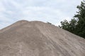 Construction site details with grit gravel, stacked in a large stack