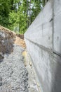 Construction site - dug out shaft next to a newly build concret