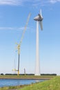 Construction site Dutch windturbine with large crane Royalty Free Stock Photo