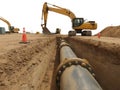 Excavator pipeline construction works with heavy industrial power Royalty Free Stock Photo