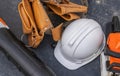 Construction Site Hard Hat and a Tools Belt Royalty Free Stock Photo