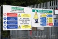 Construction site health and safety message rules sign board signage on fence boundary Royalty Free Stock Photo