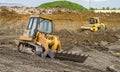 Construction Site with heavy excavating machinery Royalty Free Stock Photo