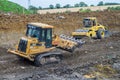 Construction Site with heavy excavating machinery Royalty Free Stock Photo