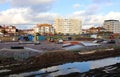 A construction site in Hove full of puddles and mud.