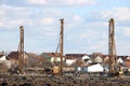 Construction site with hydraulic drilling machines and wor Royalty Free Stock Photo