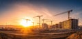 The construction site illuminated by a stunning sunset panorama over cranes. AI generated image Royalty Free Stock Photo