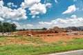 construction site of a large individual cluster of one-story houses. Foundation marking, laying of sewerage and water supply