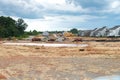 construction site of a large individual cluster of one-story houses. Marking foundations and laying asphalt roads