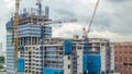 Construction site of a modern skyscraper in Singapore timelapse Royalty Free Stock Photo