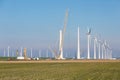 Construction site of new big Dutch wind farm in agricultural landscape