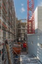 Construction site new building facade with scaffold Royalty Free Stock Photo