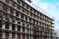Construction site , new building facade with scaffolding perspective Royalty Free Stock Photo