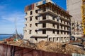 Construction site of new residential building with crane and scaffold Royalty Free Stock Photo