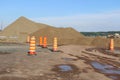 Oranges cones in construction site. Traffic Barrel. Industry.