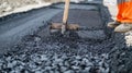 Construction workers are laying new asphalt road pavement at a construction site in a residential area, Ai Generated