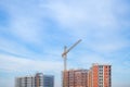 Construction site, residential building project development and construction crane Royalty Free Stock Photo