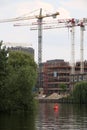 Berlin, Germany, 13 June 2018. A construction site on the river bank in Berlin. Tower cranes rise into the sky