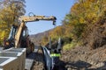 Construction site road burial of u-shaped gutter precast concrete drain