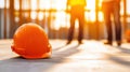 Construction site safety, hard hat on the ground symbolizing workplace protection and worker precautions Royalty Free Stock Photo