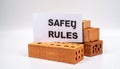 Construction Site Safety Rules Concept with Bricks Royalty Free Stock Photo