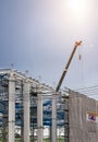 Construction site with scaffold tower and warning label building with sky background,scaffolding for construction factory