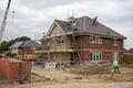 Construction of a new residential house at building site Royalty Free Stock Photo