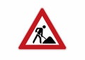 Construction site sign - caution, construction works traffic sign Royalty Free Stock Photo