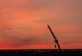 Construction site  silhouette on sunset background Royalty Free Stock Photo