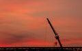 Construction site  silhouette on sunset background Royalty Free Stock Photo