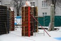 Construction site in the snow in winter. Construction of a residential building in difficult winter conditions, ice and snow on Royalty Free Stock Photo