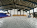 Construction site of sports hall, basketball court renovation, school gym indoor changing hardwood parquet flor and