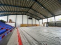 Construction site of sports hall, basketball court renovation, school gym indoor changing hardwood parquet flor and